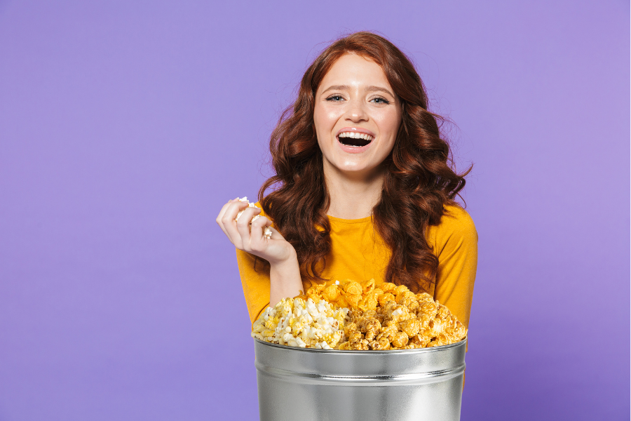 Female eating popcorn
